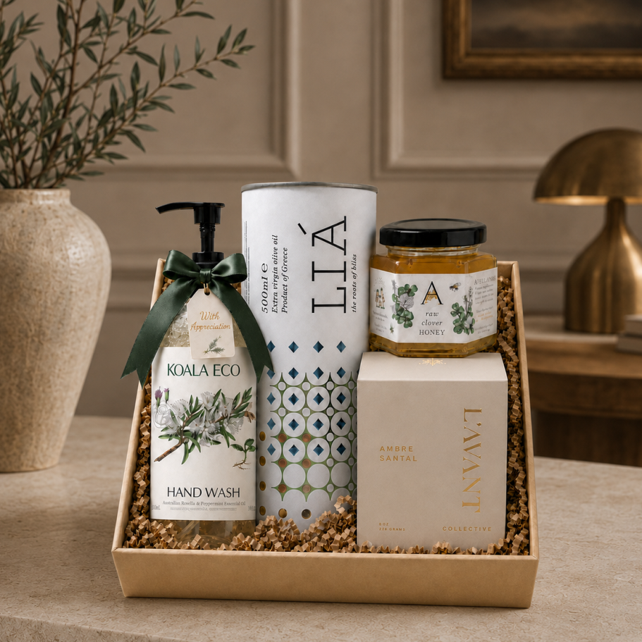 Home Sweet Home | Hostess Appreciation Gift box curated gift box with artisan orange blossom honey, a luxury amber sandal candle, Lia EVOO in unique packaging, and upscale Hand Wash.